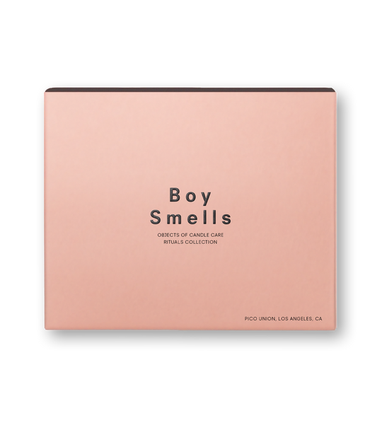 Product shot of the pink box with black text and the Boy Smells logo against a neutral background.